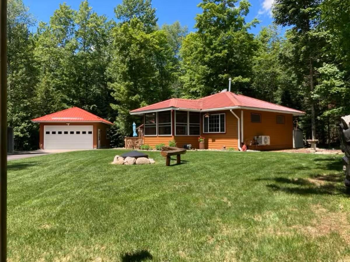 13612 East Rock Lake Road Presque Isle, WI 54557 - Photo 1 of 65 Gallery Image 1