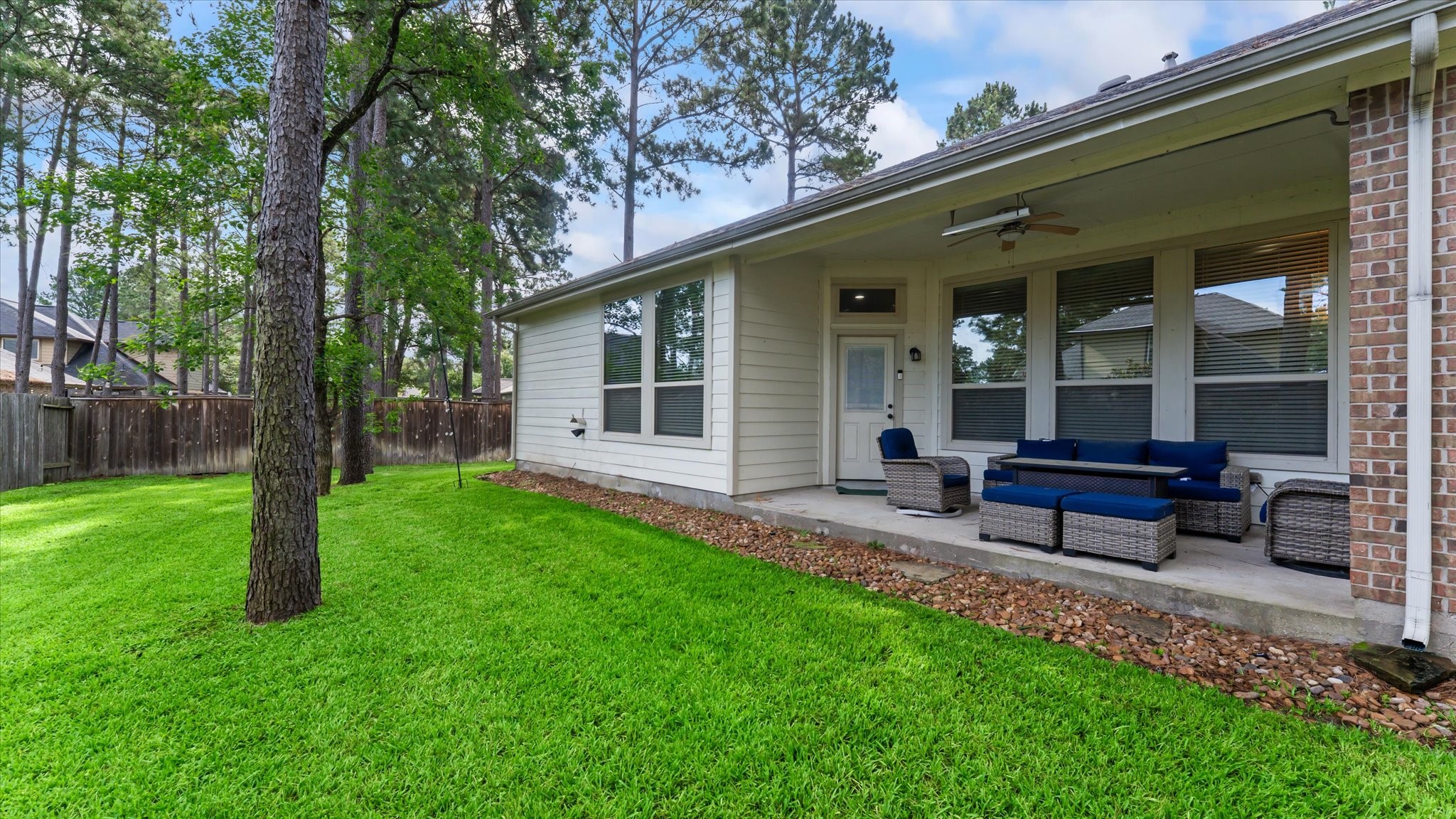 14 Painted Post Place Spring, TX 77389 - Photo 39 of 43 a house view with a bench and garden