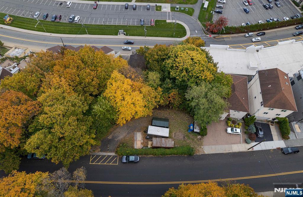 1106-1108 River Road Edgewater, NJ 07020 - Photo 13 of 20 an aerial view of a house with a yard and lake view