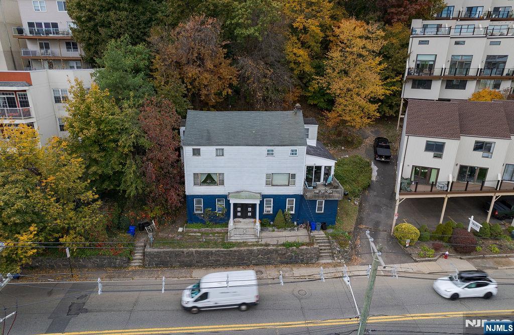 1106-1108 River Road Edgewater, NJ 07020 - Photo 3 of 20 front view of house with a street