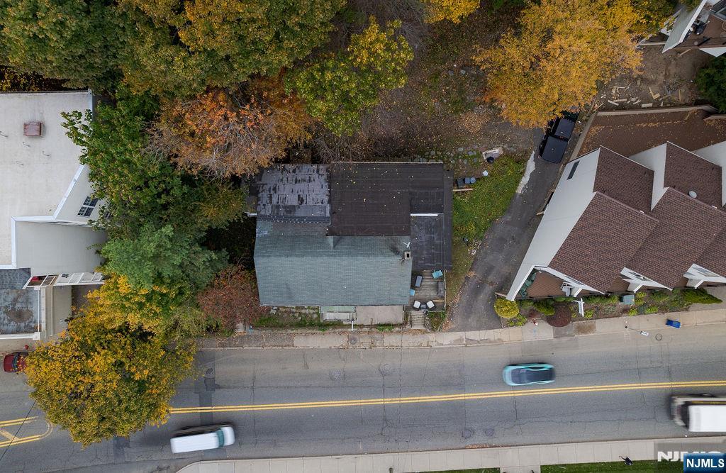 1106-1108 River Road Edgewater, NJ 07020 - Photo 7 of 20 an aerial view of a house with a garden