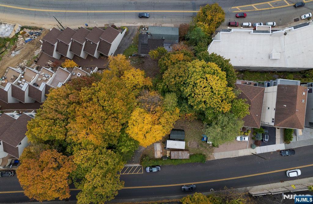 1106-1108 River Road Edgewater, NJ 07020 - Photo 10 of 19 an aerial view of a house with a yard and garden