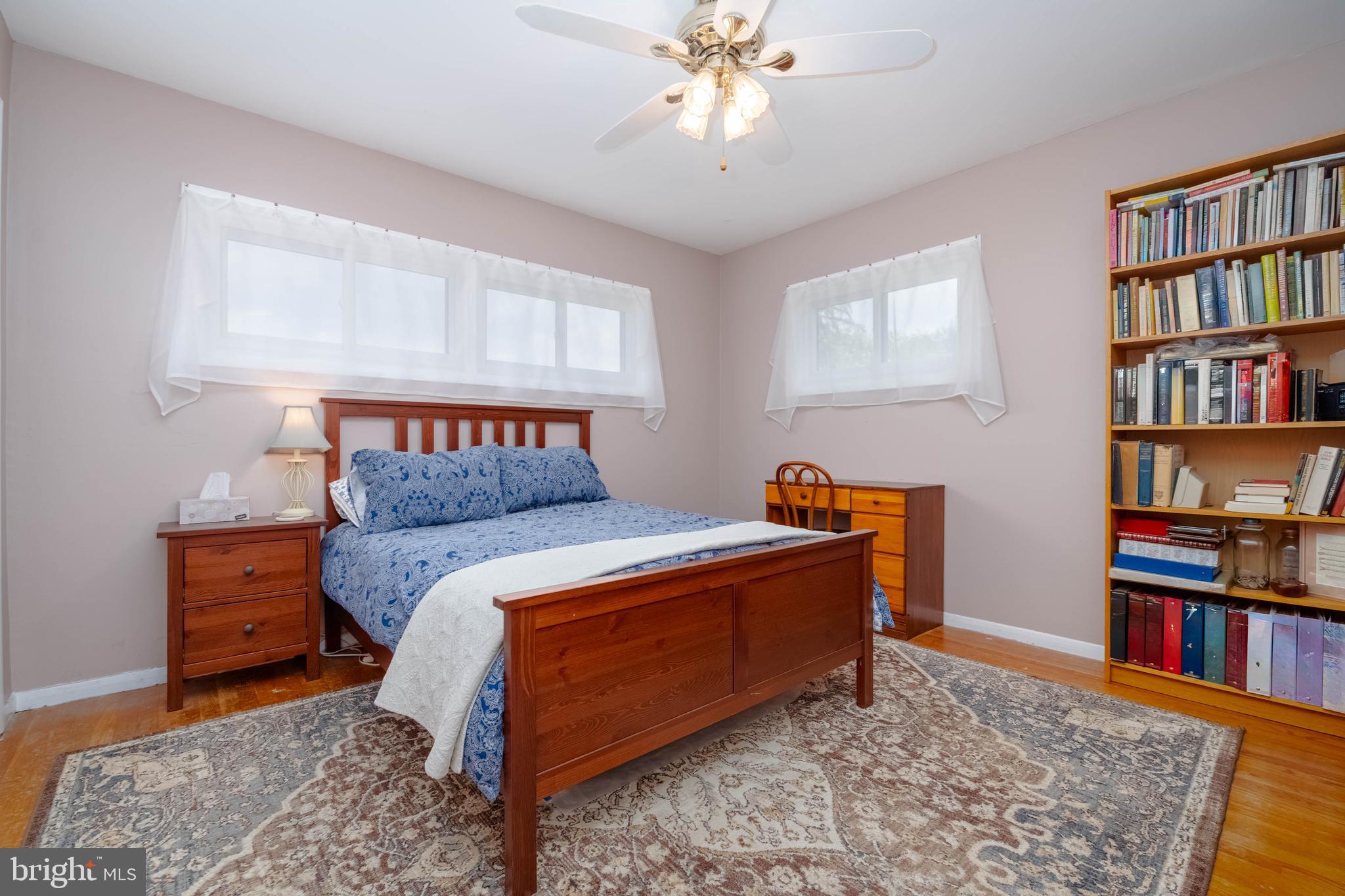 8600 Saddler Road Parkville, MD 21234 - Photo 24 of 39 a bedroom with furniture and a book shelf