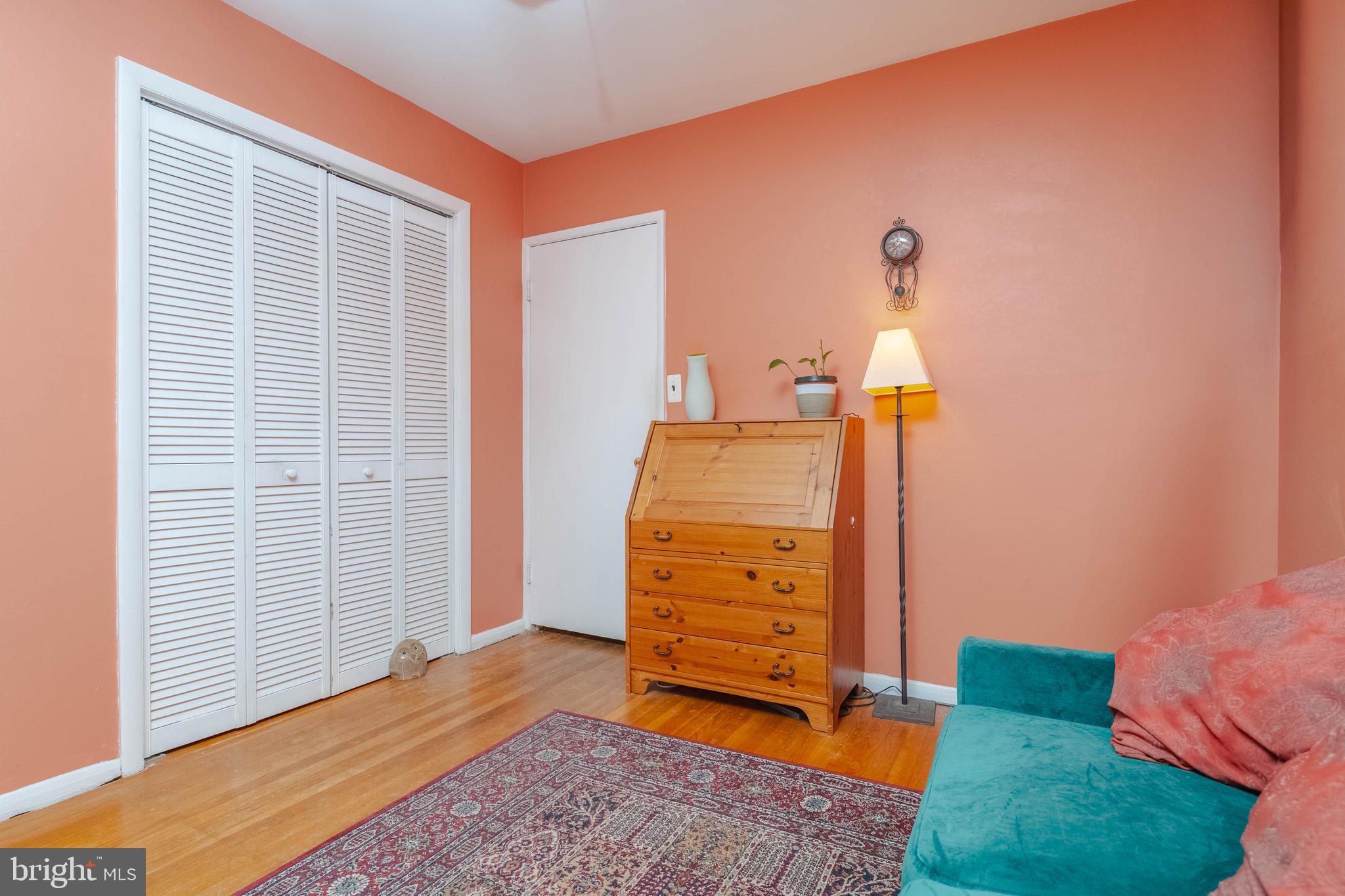 8600 Saddler Road Parkville, MD 21234 - Photo 28 of 39 a bed room with a bed and a dresser
