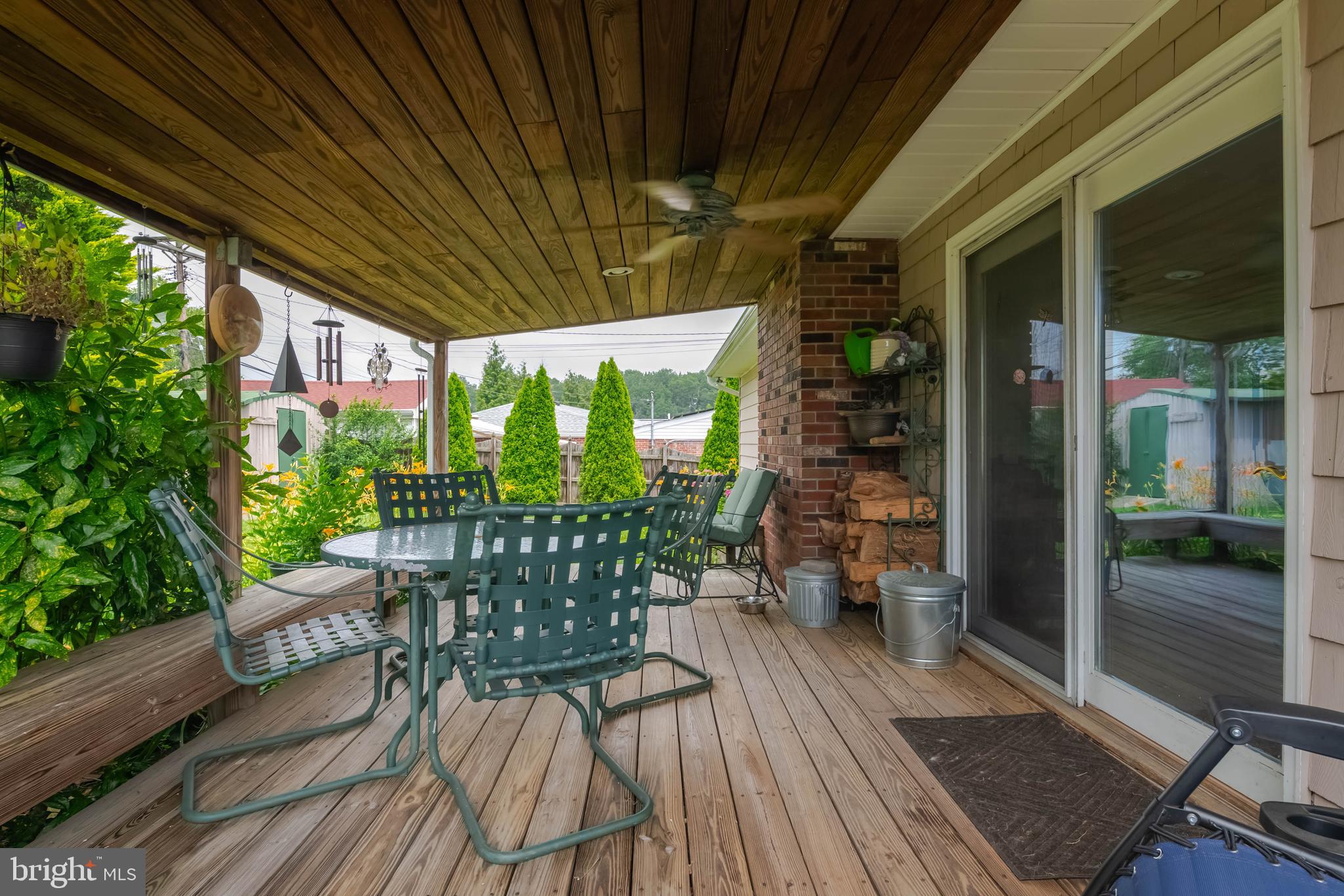 8600 Saddler Road Parkville, MD 21234 - Photo 38 of 39 a patio with glass top table and chairs