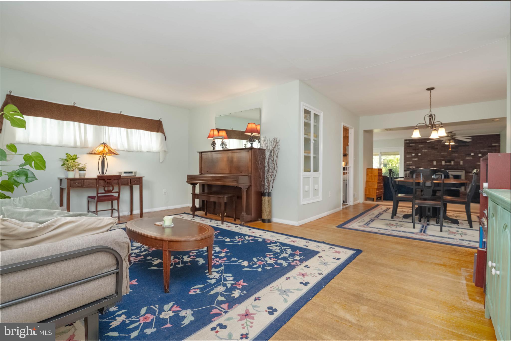 8600 Saddler Road Parkville, MD 21234 - Photo 4 of 39 a living room with furniture and a fireplace