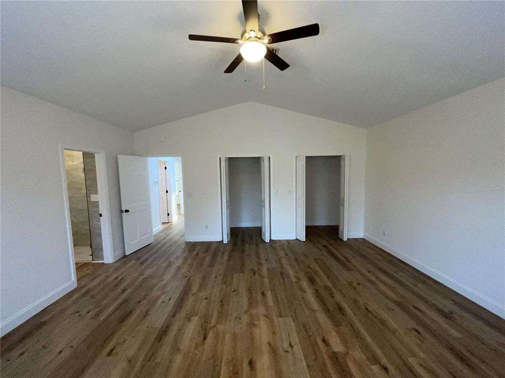 755 South Narcoossee Road St. Cloud, FL 34771 - Photo 19 of 44 a view of empty room with wooden floor