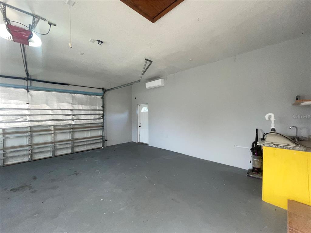 755 South Narcoossee Road St. Cloud, FL 34771 - Photo 30 of 44 a view of a room with storage and utility room