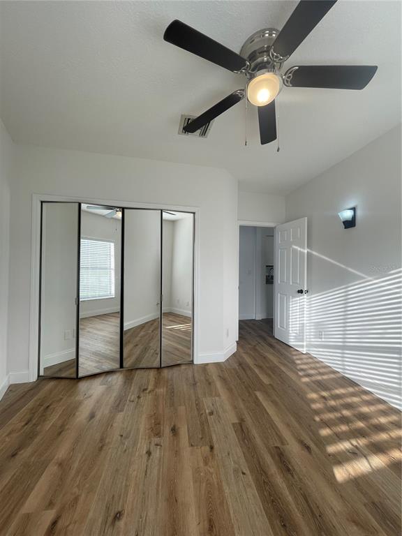 755 South Narcoossee Road St. Cloud, FL 34771 - Photo 35 of 44 a view of empty room with wooden floor