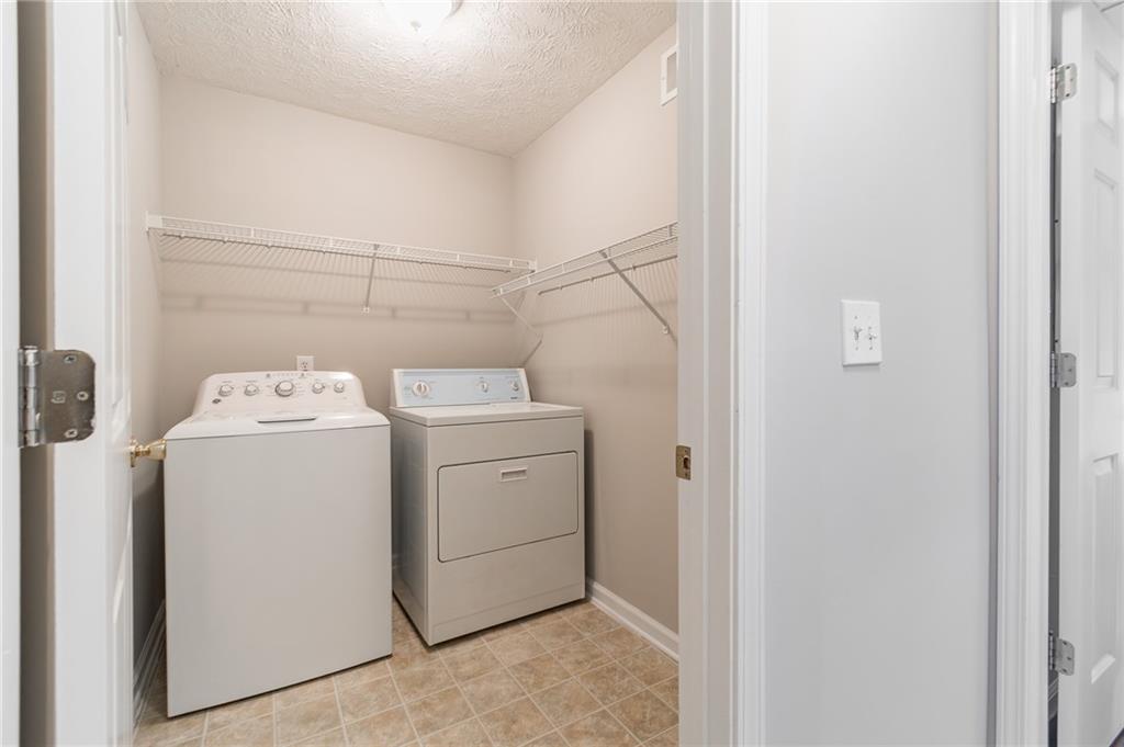 5014 Red Oak Lane Gainesville, GA 30506 - Photo 34 of 43 a utility room with dryer and washer