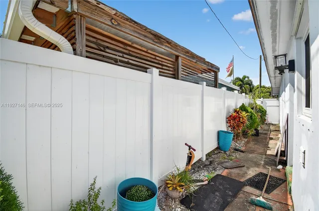 a potted plant sitting in front of a window