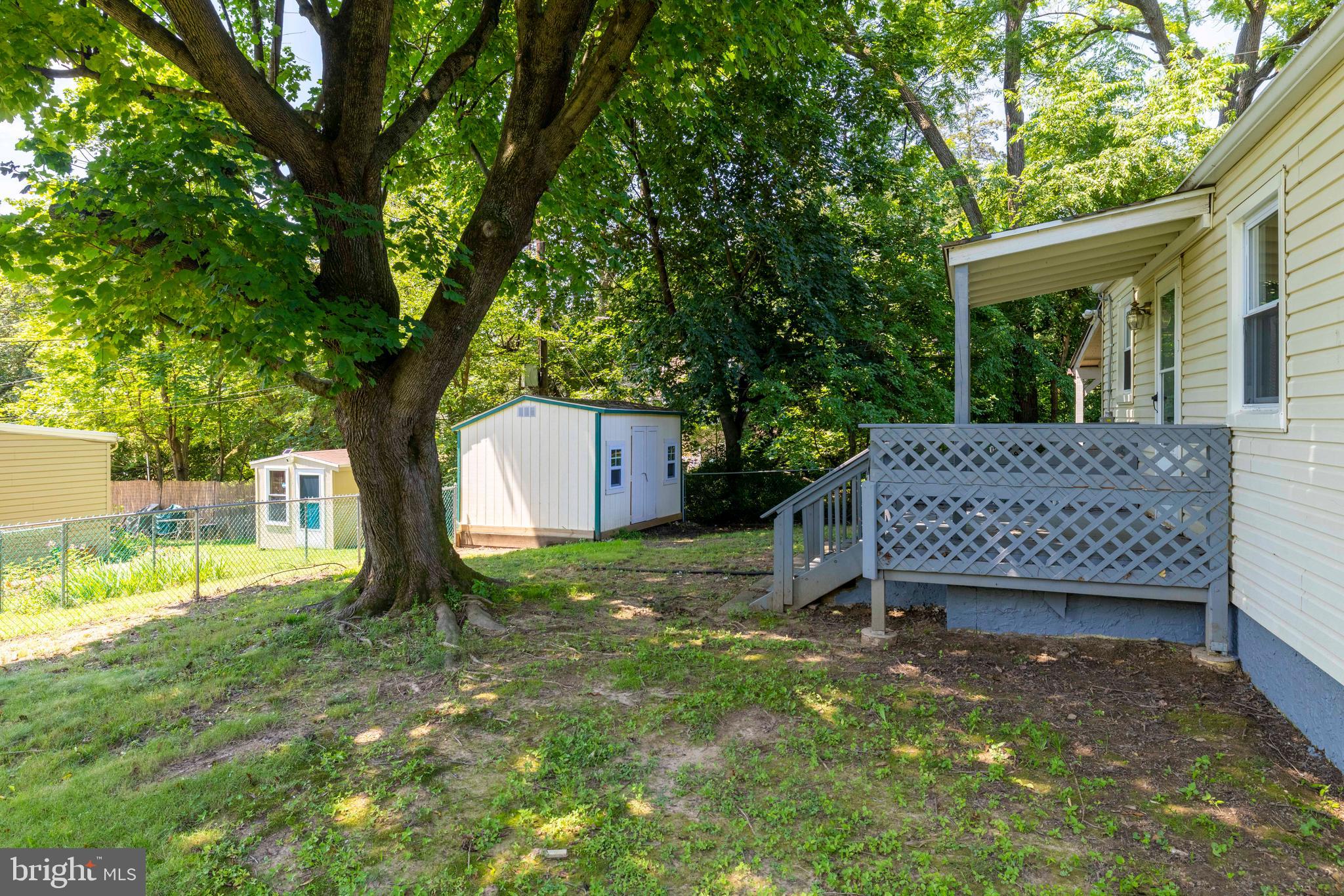 1210 Brownsville Road Langhorne, PA 19047 - Photo 11 of 13 a view of a backyard with a tree