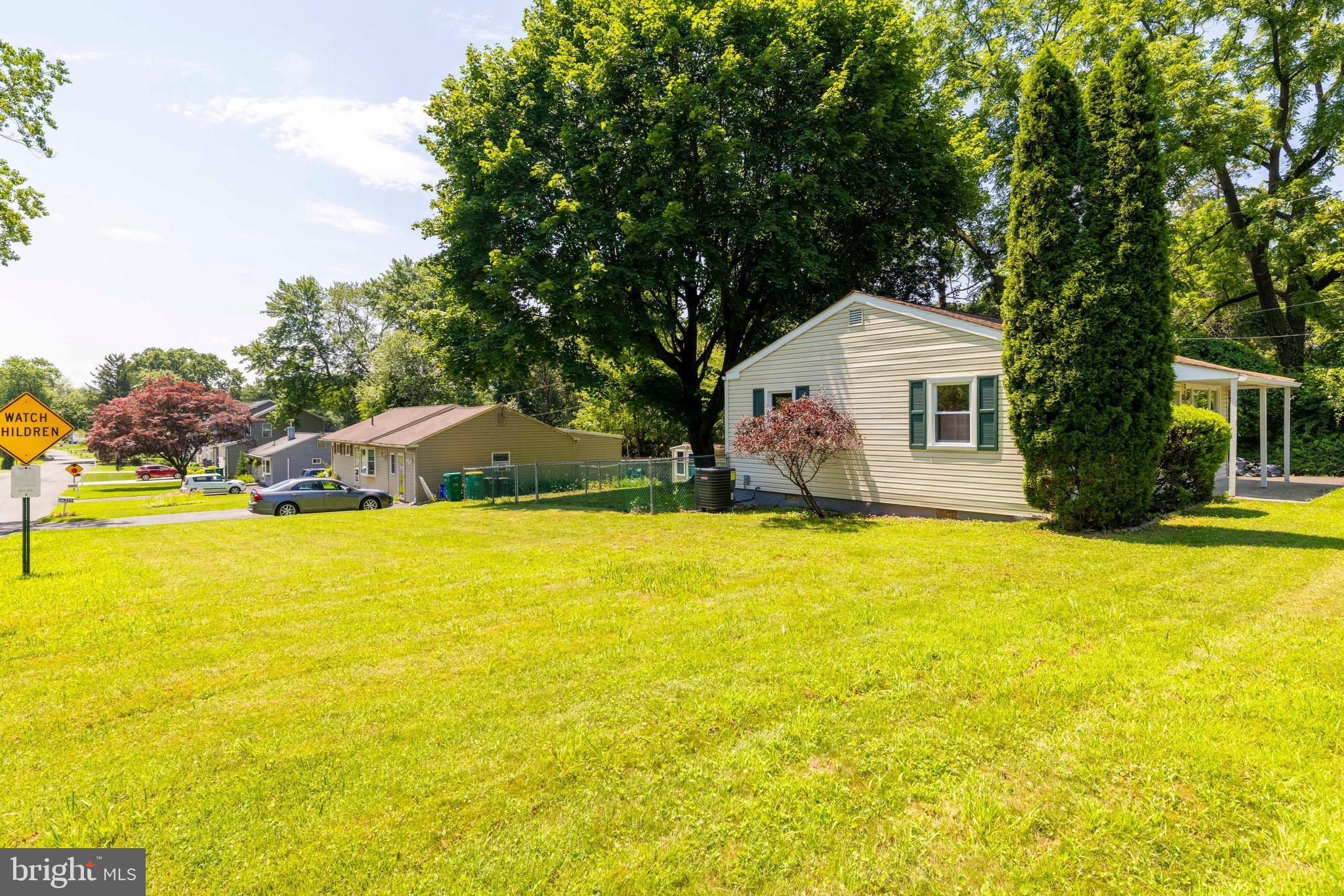1210 Brownsville Road Langhorne, PA 19047 - Photo 13 of 13 a view of a swimming pool with lawn chairs and plants