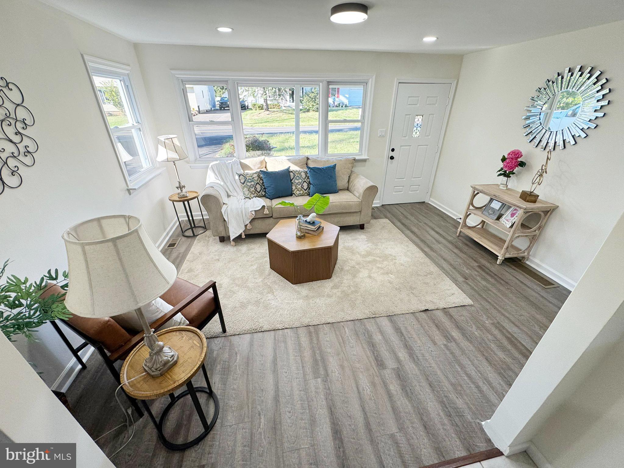 1210 Brownsville Road Langhorne, PA 19047 - Photo 3 of 13 a living room with furniture and wooden floor