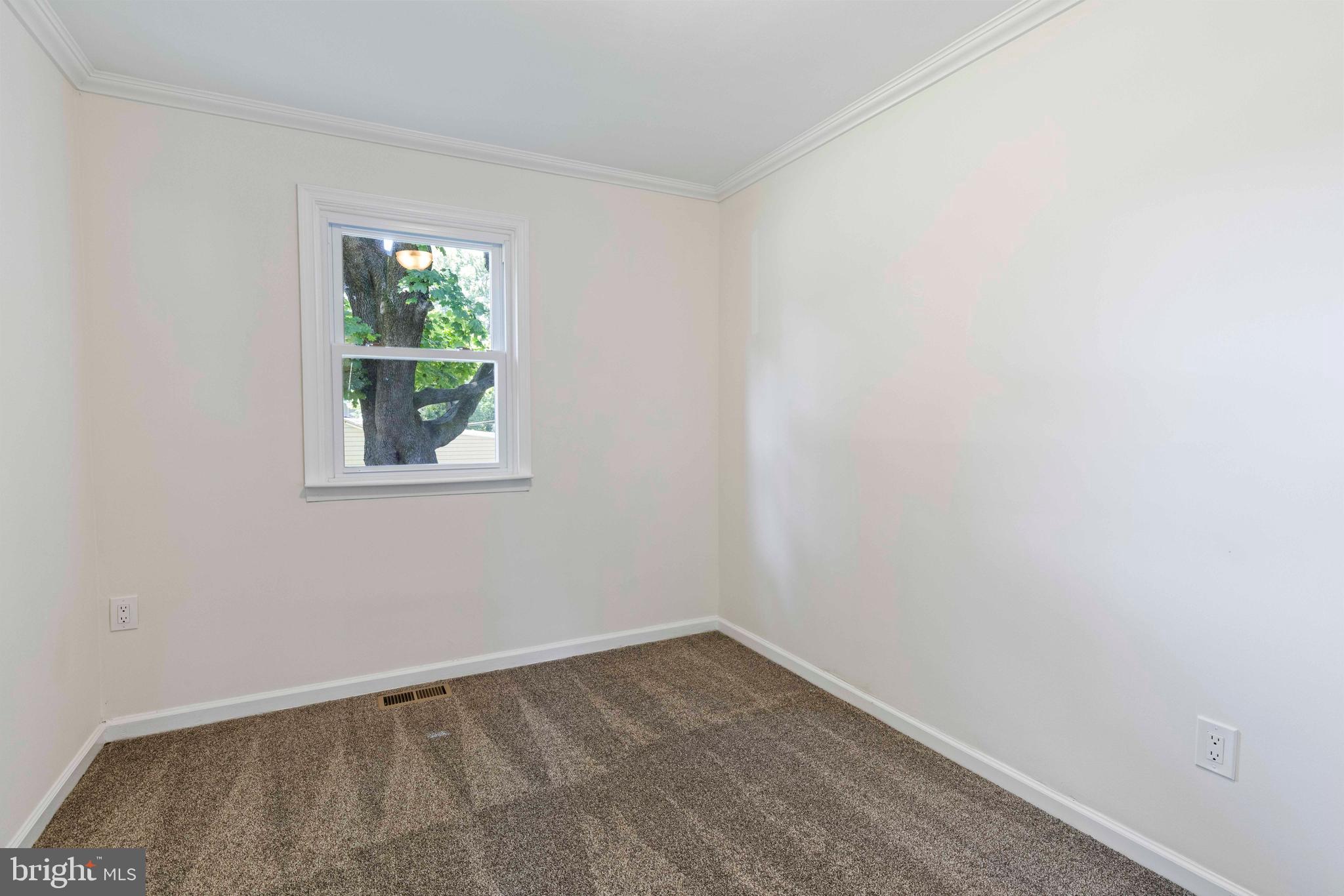 1210 Brownsville Road Langhorne, PA 19047 - Photo 8 of 13 an empty room with a window