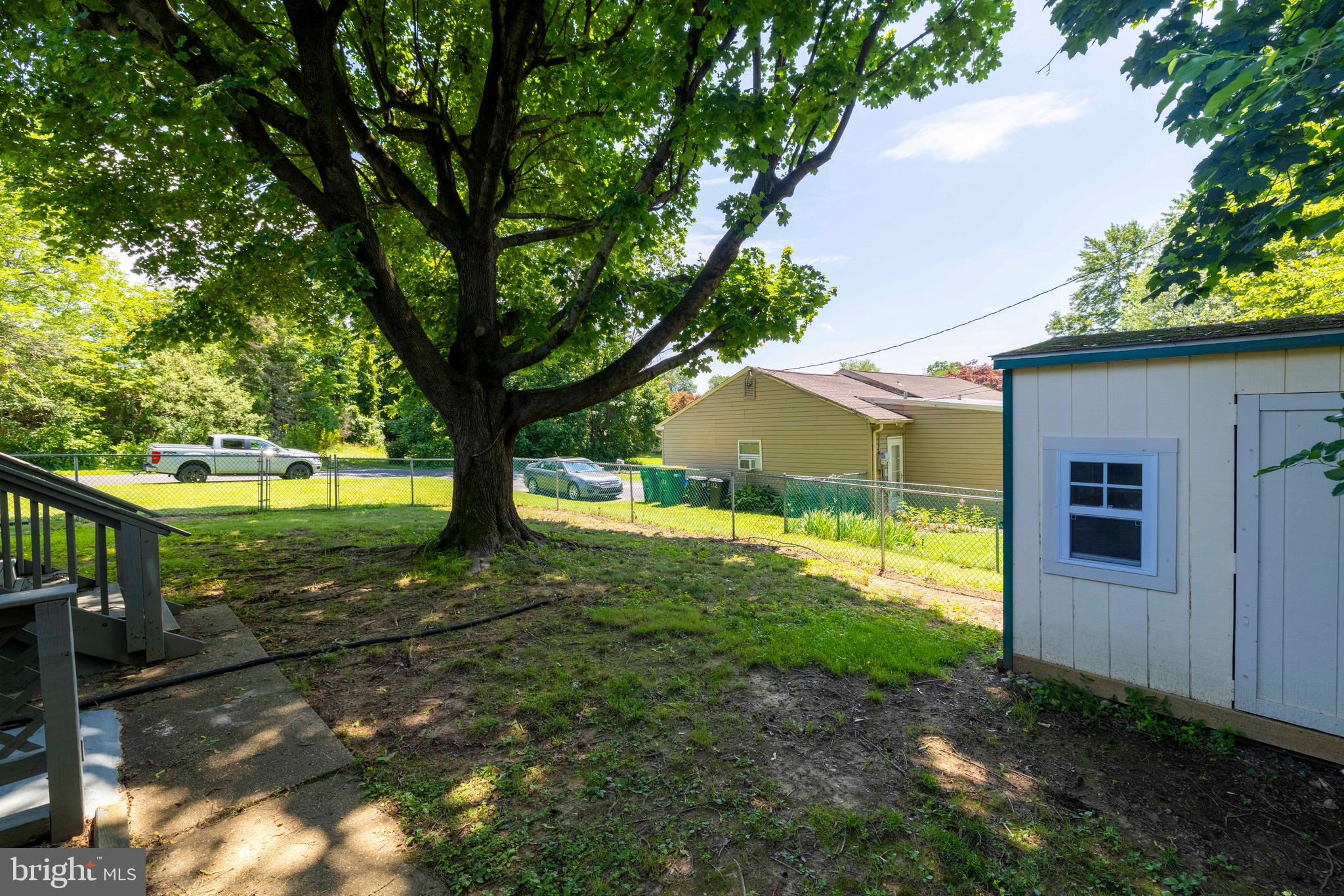 1210 Brownsville Road Langhorne, PA 19047 - Photo 9 of 13 a view of a backyard with large trees