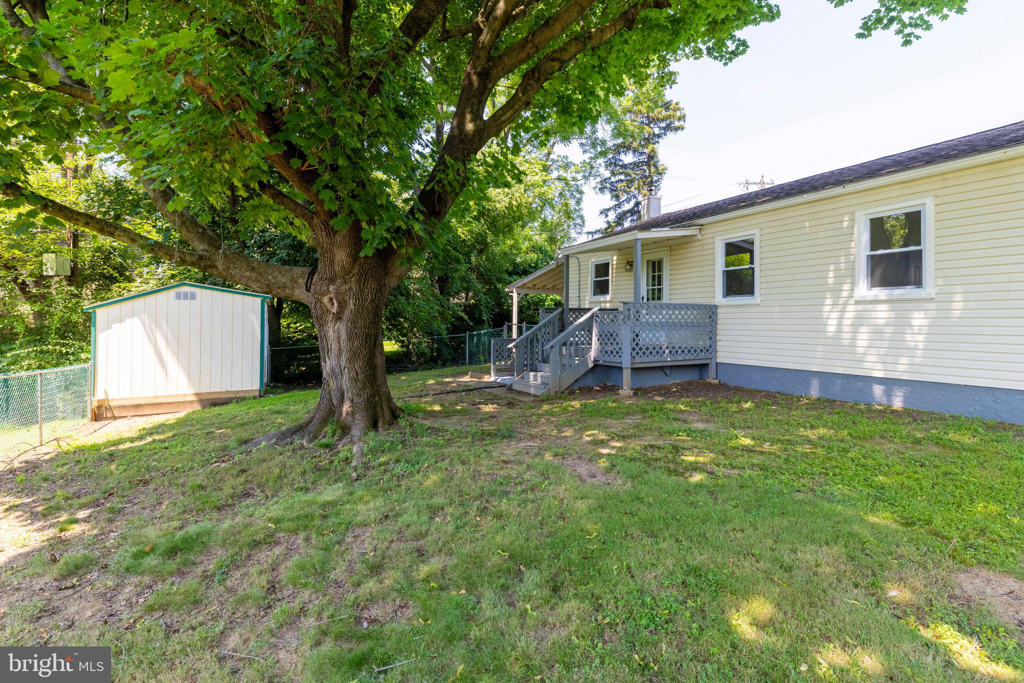 1210 Brownsville Road Langhorne, PA 19047 - Photo 10 of 13 a backyard of a house with seating space
