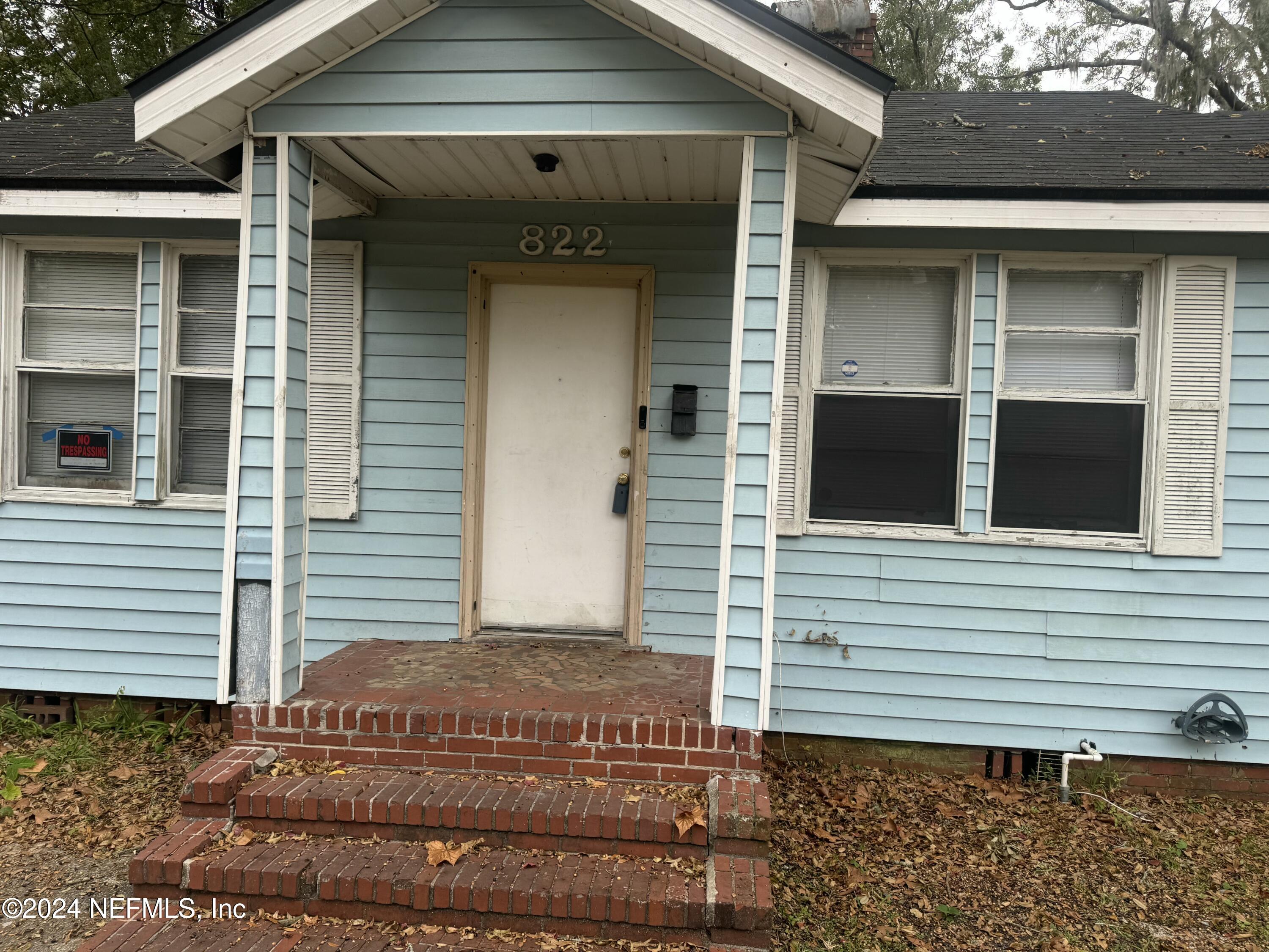 822 Saranac Street Jacksonville, FL 32254 - Photo 14 of 17 a view of a house with a door