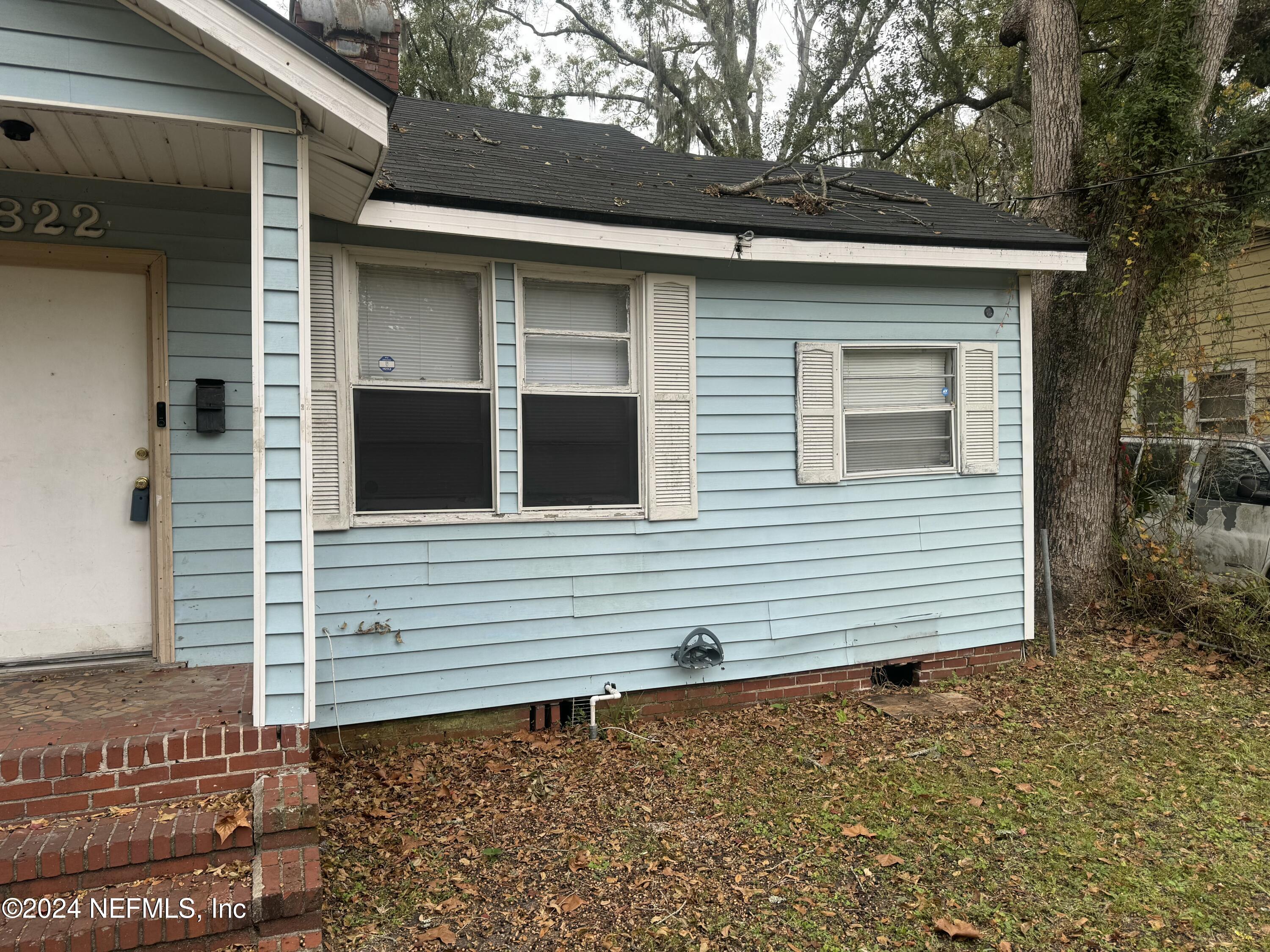 822 Saranac Street Jacksonville, FL 32254 - Photo 16 of 17 a front view of a house with garage