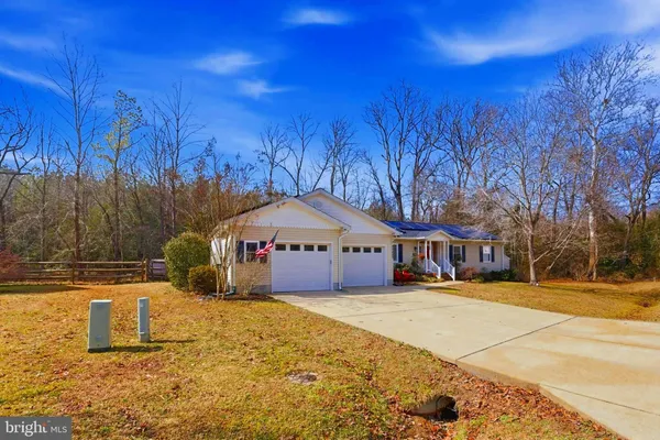 a view of outdoor space yard and front view of a house