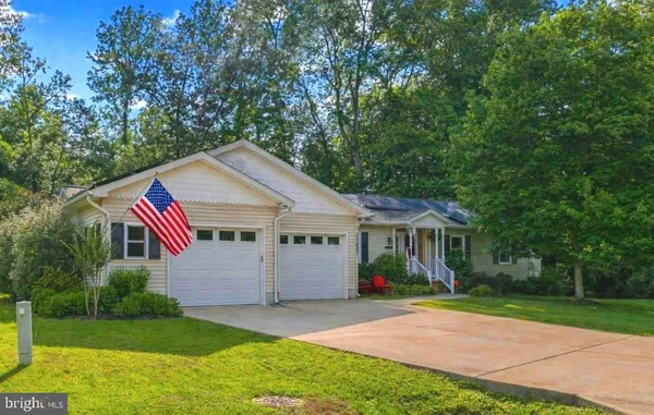 a view of a house with a big yard