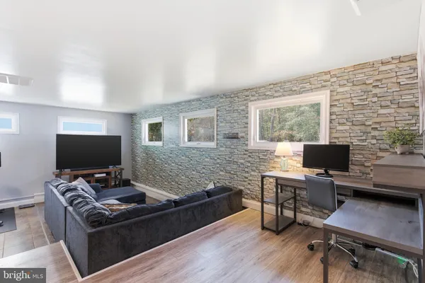 a living room with furniture and a couch