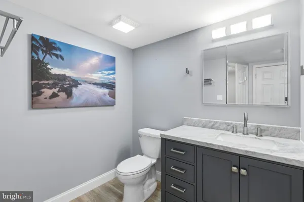 a bathroom with a sink and shower