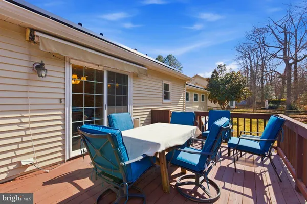 a view of balcony with furniture