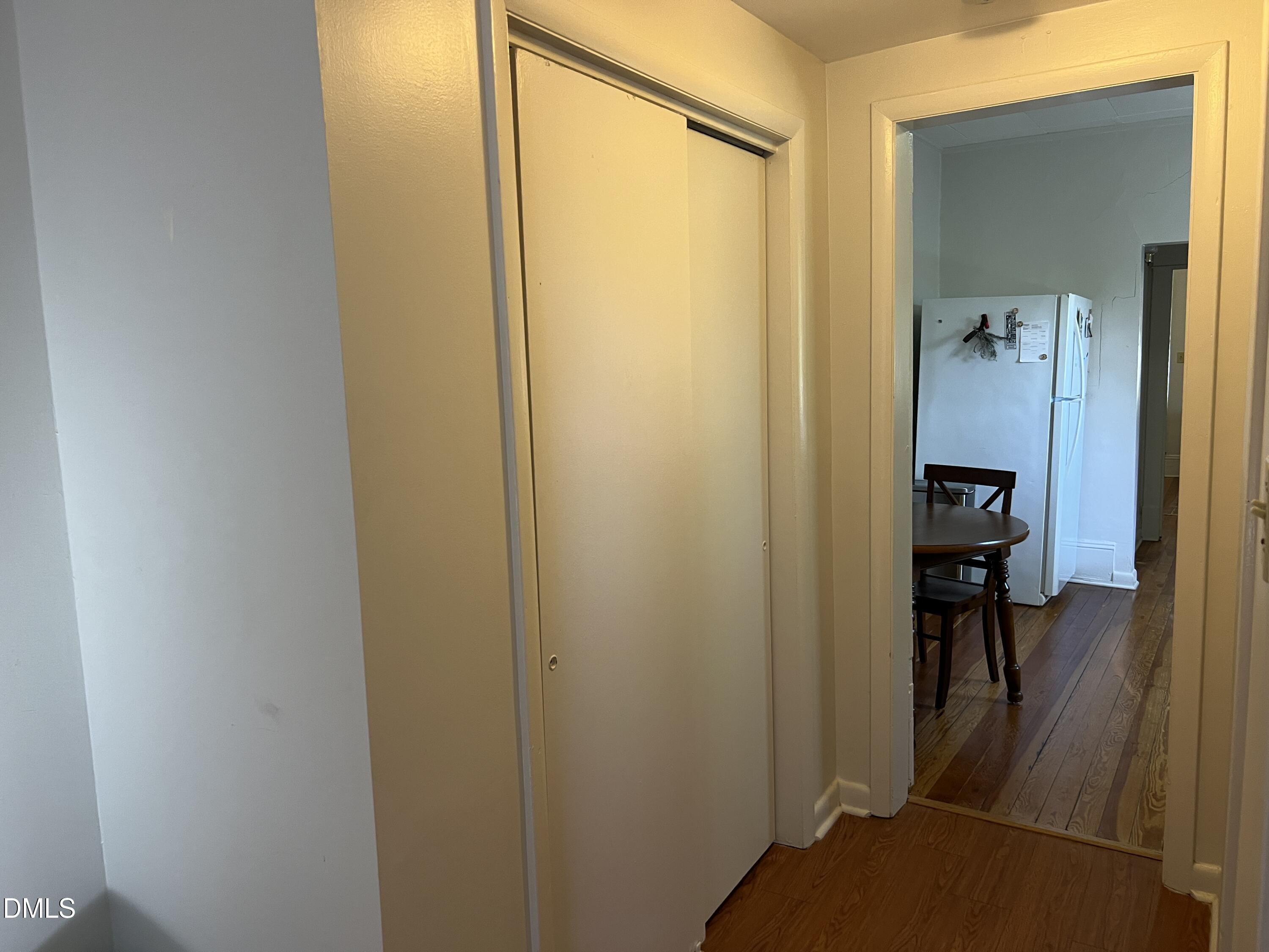503 Cole Street, Unit 1/2 Raleigh, NC 27605 - Photo 16 of 35 a view of a hallway with a closet and a living room