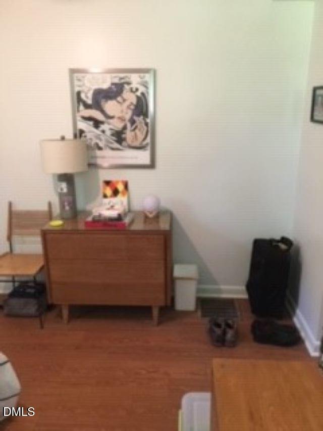 503 Cole Street, Unit 1/2 Raleigh, NC 27605 - Photo 18 of 35 a bedroom with furniture and a bed