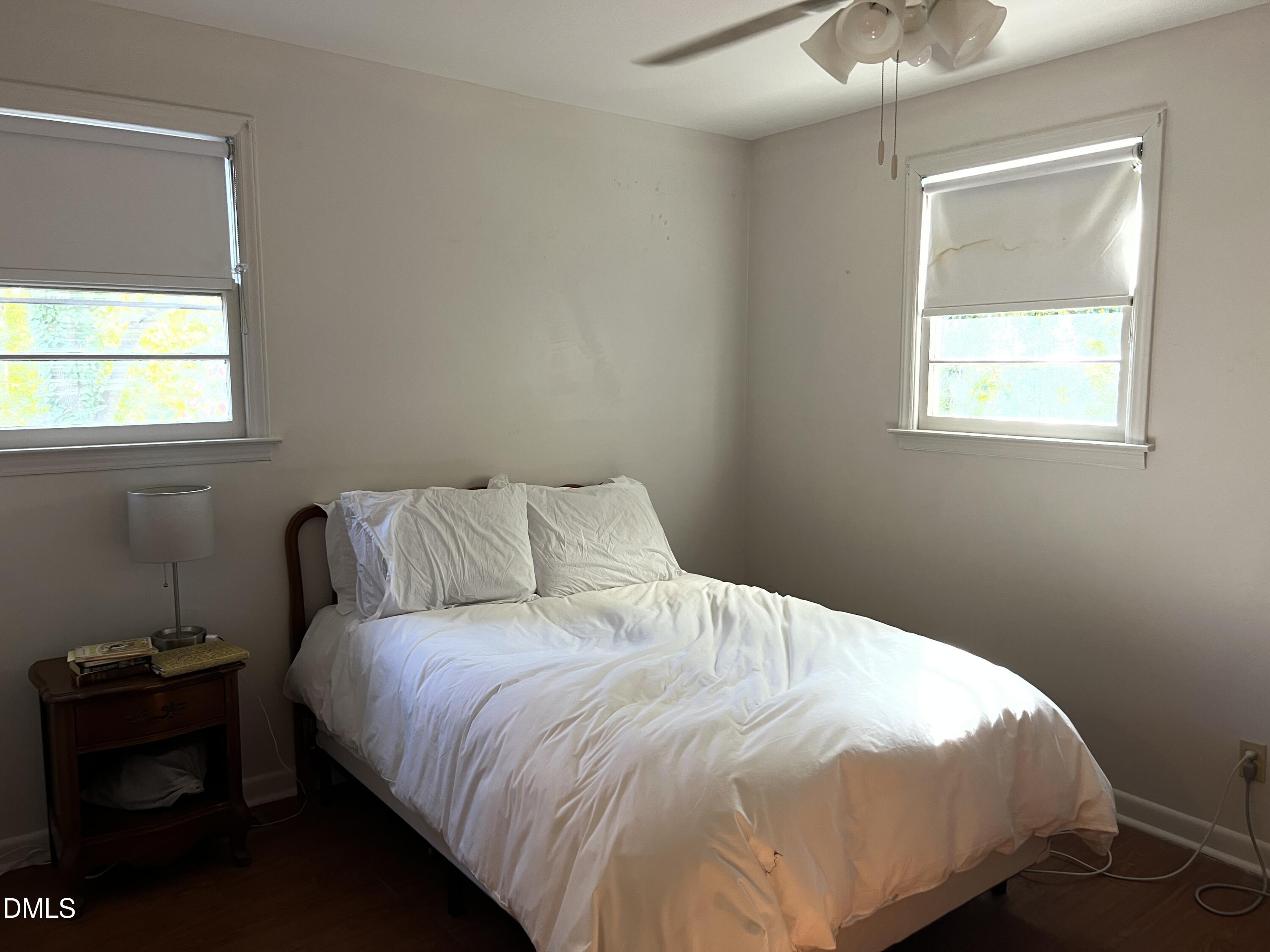 503 Cole Street, Unit 1/2 Raleigh, NC 27605 - Photo 20 of 35 a bedroom with a bed and a window