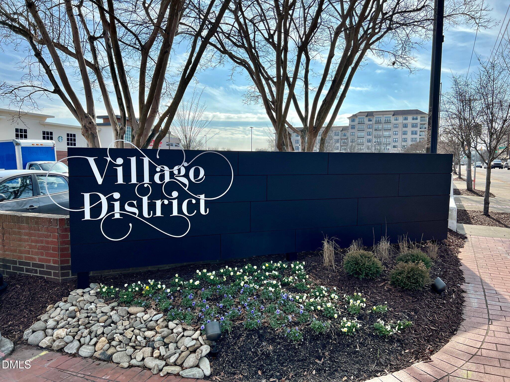 503 Cole Street, Unit 1/2 Raleigh, NC 27605 - Photo 22 of 35 a sign that is sitting in front of a house