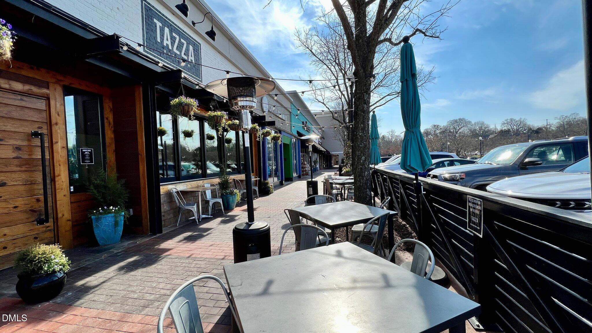 503 Cole Street, Unit 1/2 Raleigh, NC 27605 - Photo 23 of 35 a outdoor space with lots of tables and chairs