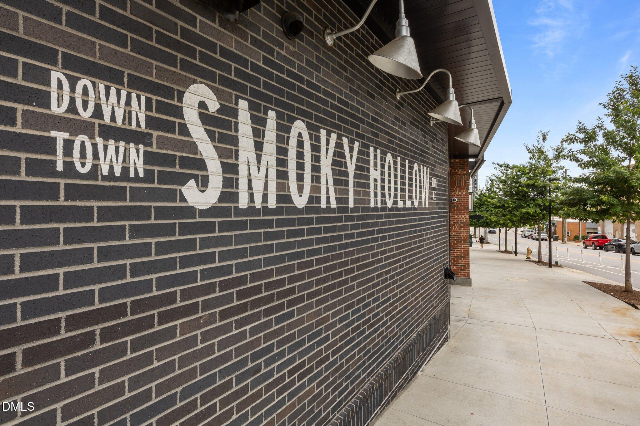 503 Cole Street, Unit 1/2 Raleigh, NC 27605 - Photo 28 of 35 a view of a pathway along a building