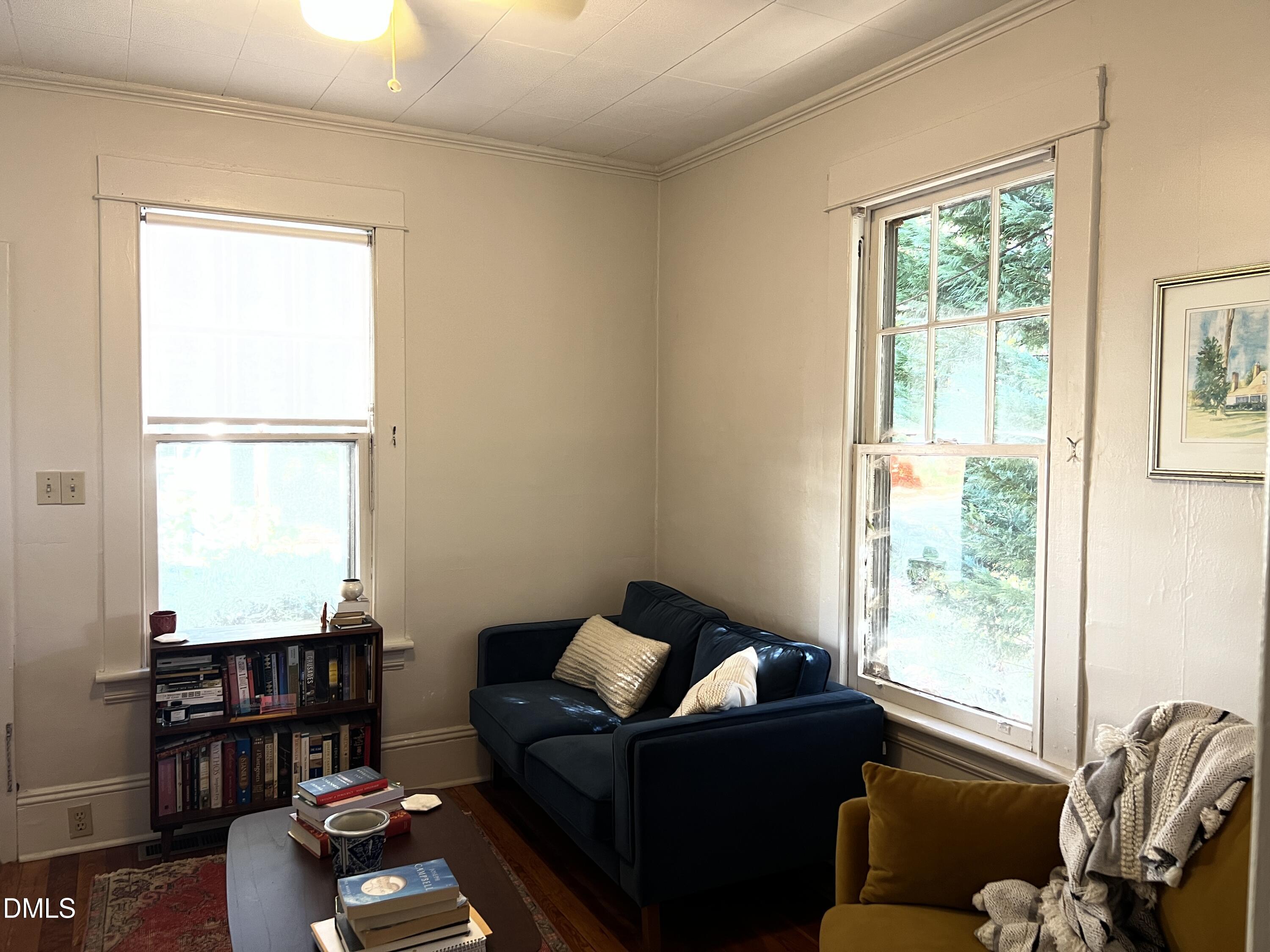 503 Cole Street, Unit 1/2 Raleigh, NC 27605 - Photo 3 of 35 a living room with furniture and a window