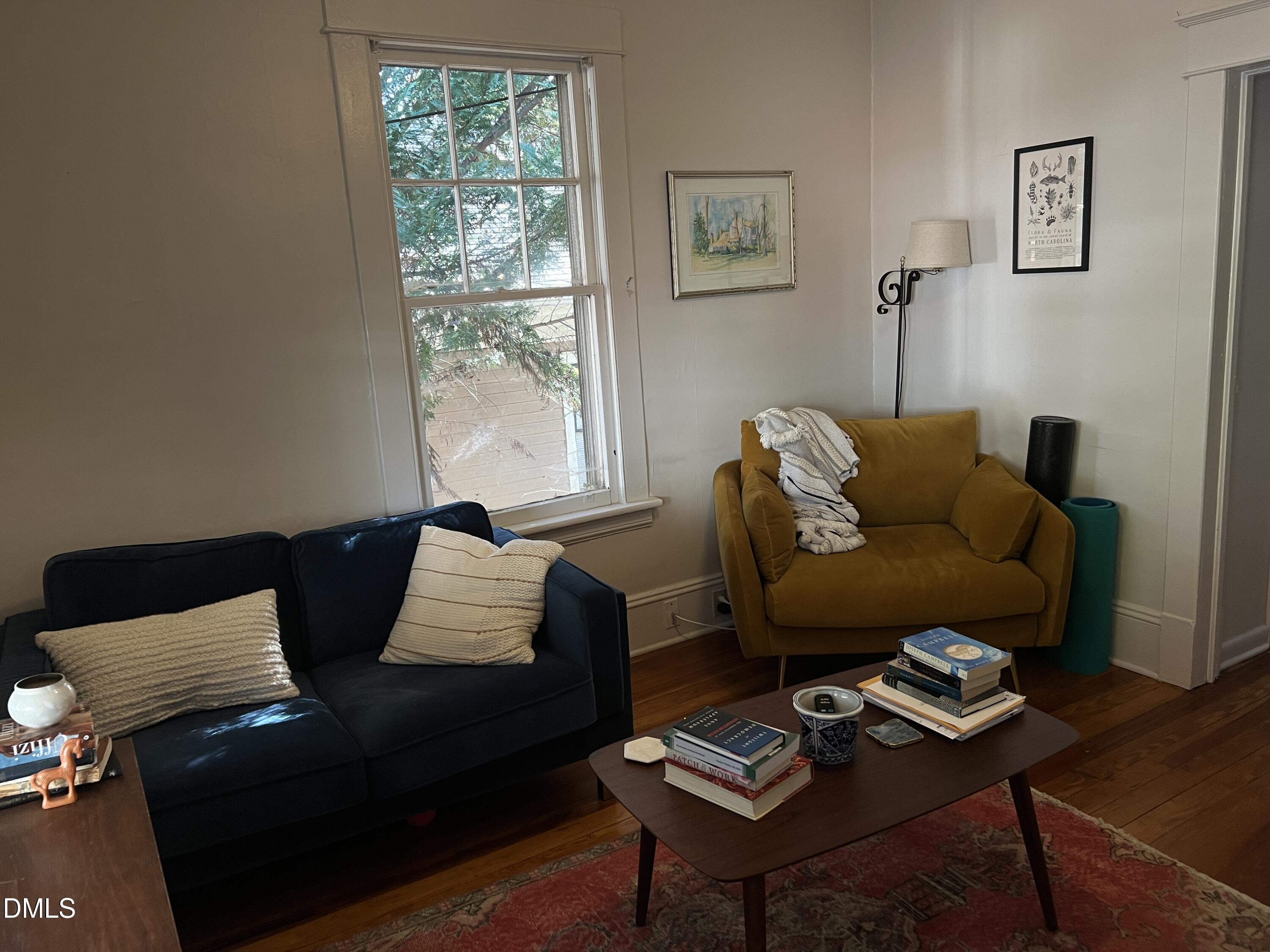 503 Cole Street, Unit 1/2 Raleigh, NC 27605 - Photo 4 of 35 a living room with furniture and a window