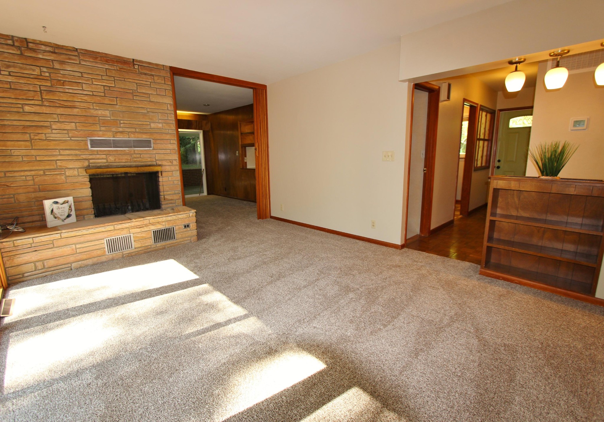 133 North Seneca Road Oak Ridge, TN 37830 - Photo 11 of 35 a view of a livingroom with an empty space and a fireplace