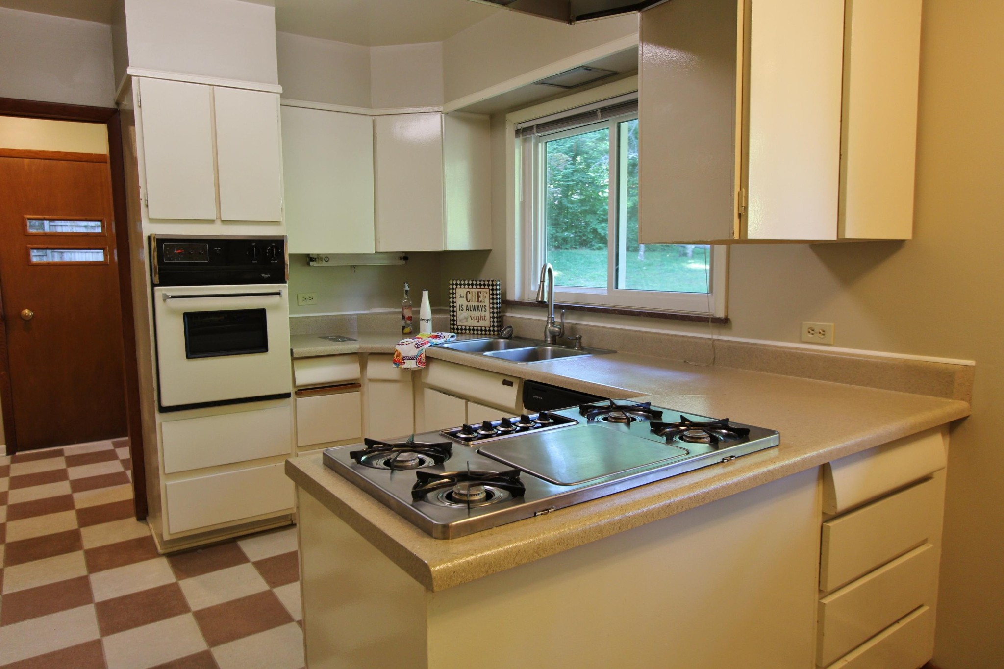 133 North Seneca Road Oak Ridge, TN 37830 - Photo 15 of 35 a white stove top oven sitting inside of a kitchen