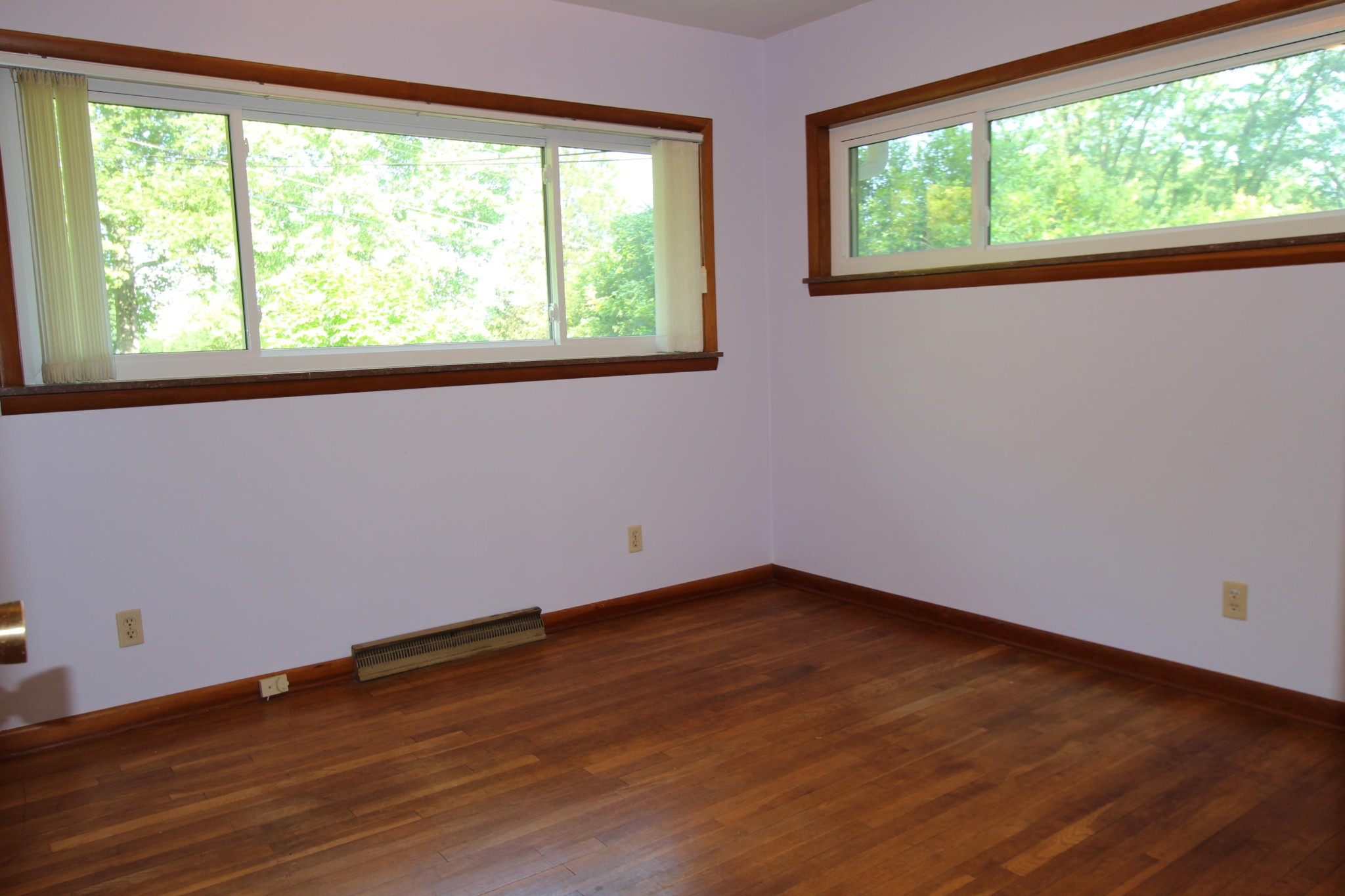 133 North Seneca Road Oak Ridge, TN 37830 - Photo 24 of 35 a view of an empty room with wooden floor and a window