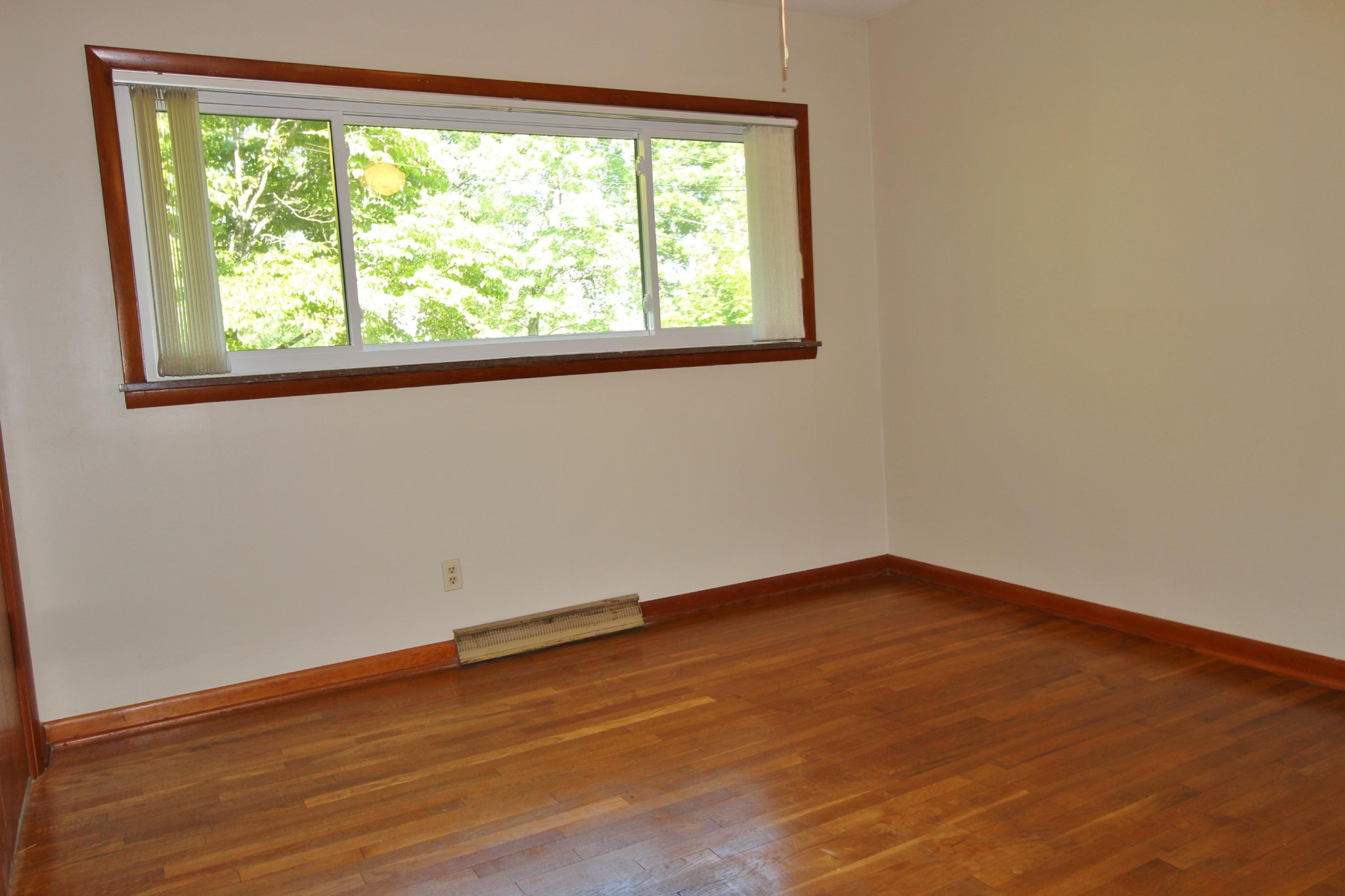 133 North Seneca Road Oak Ridge, TN 37830 - Photo 25 of 35 an empty room with wooden floor and windows