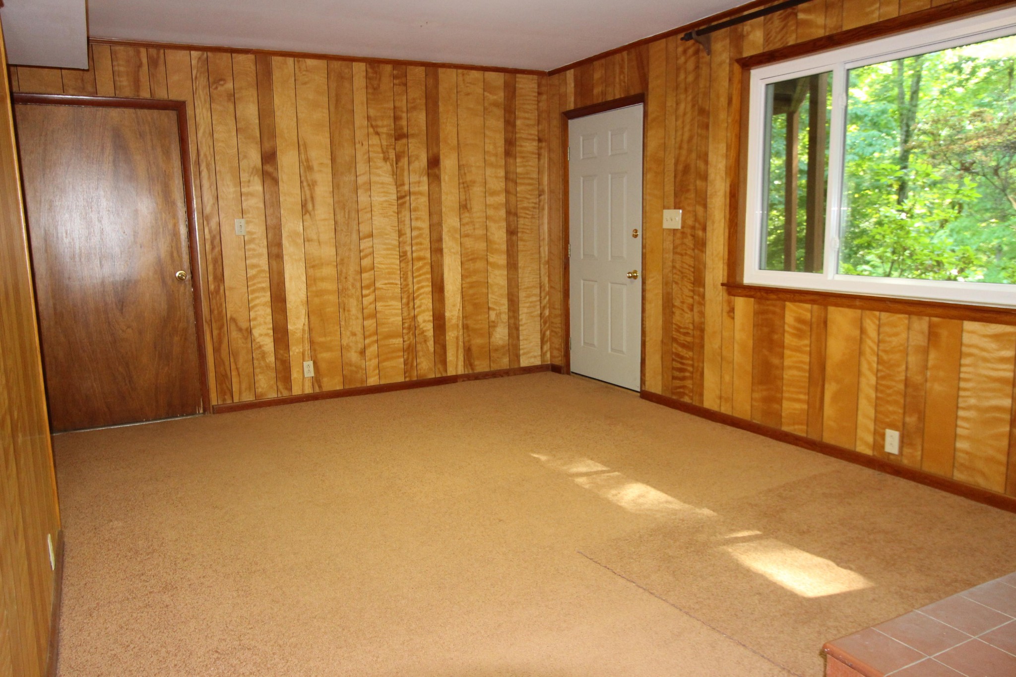 133 North Seneca Road Oak Ridge, TN 37830 - Photo 31 of 35 a view of an empty room with a window and door