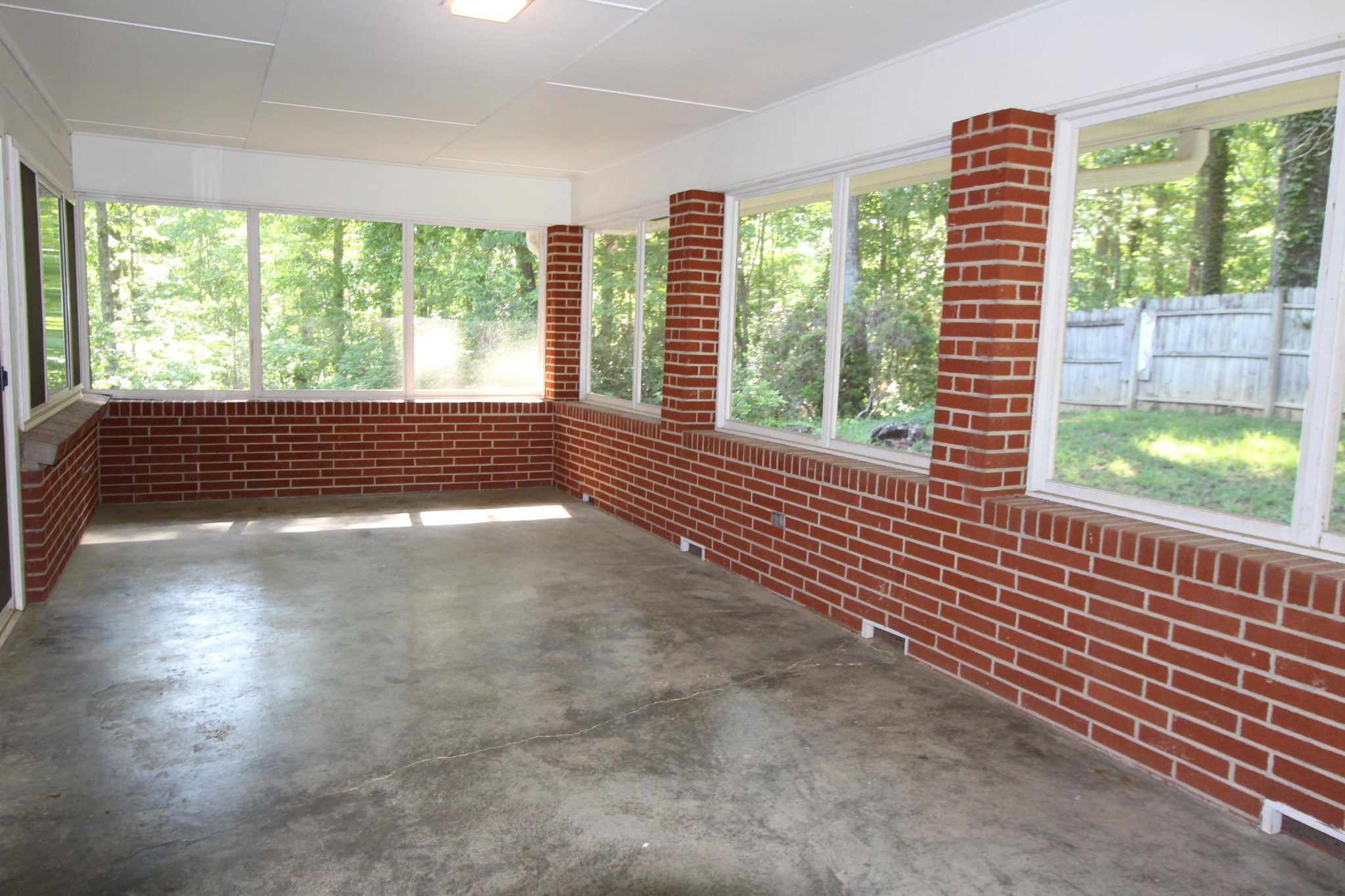 133 North Seneca Road Oak Ridge, TN 37830 - Photo 7 of 35 a view of empty room with windows