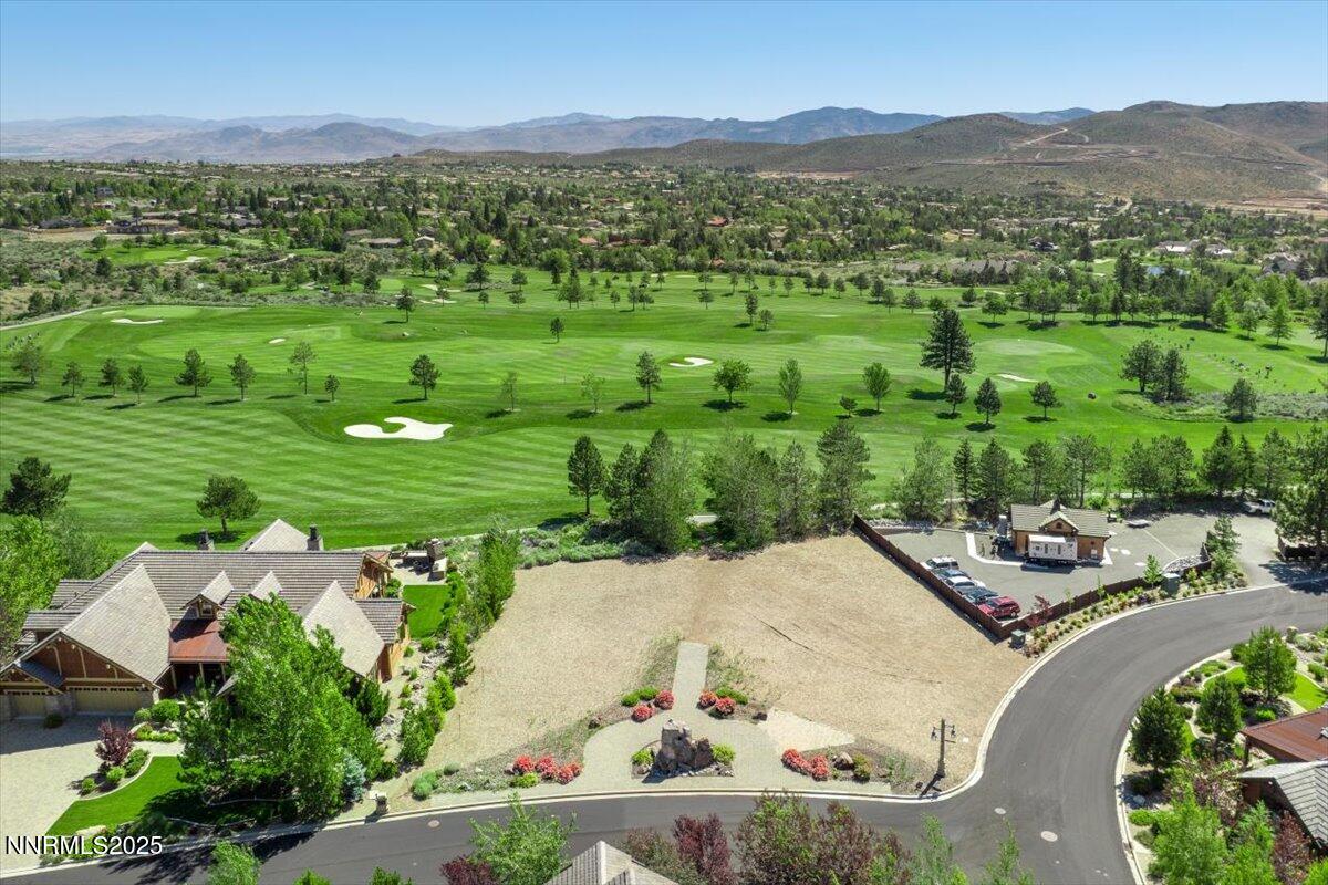 5605 Alpinista Circle Reno, NV 89511 - Photo 3 of 15 a view of a lush green hillside and houses