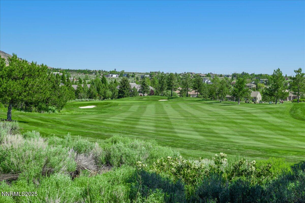 5605 Alpinista Circle Reno, NV 89511 - Photo 10 of 15 a view of a grassy field with trees