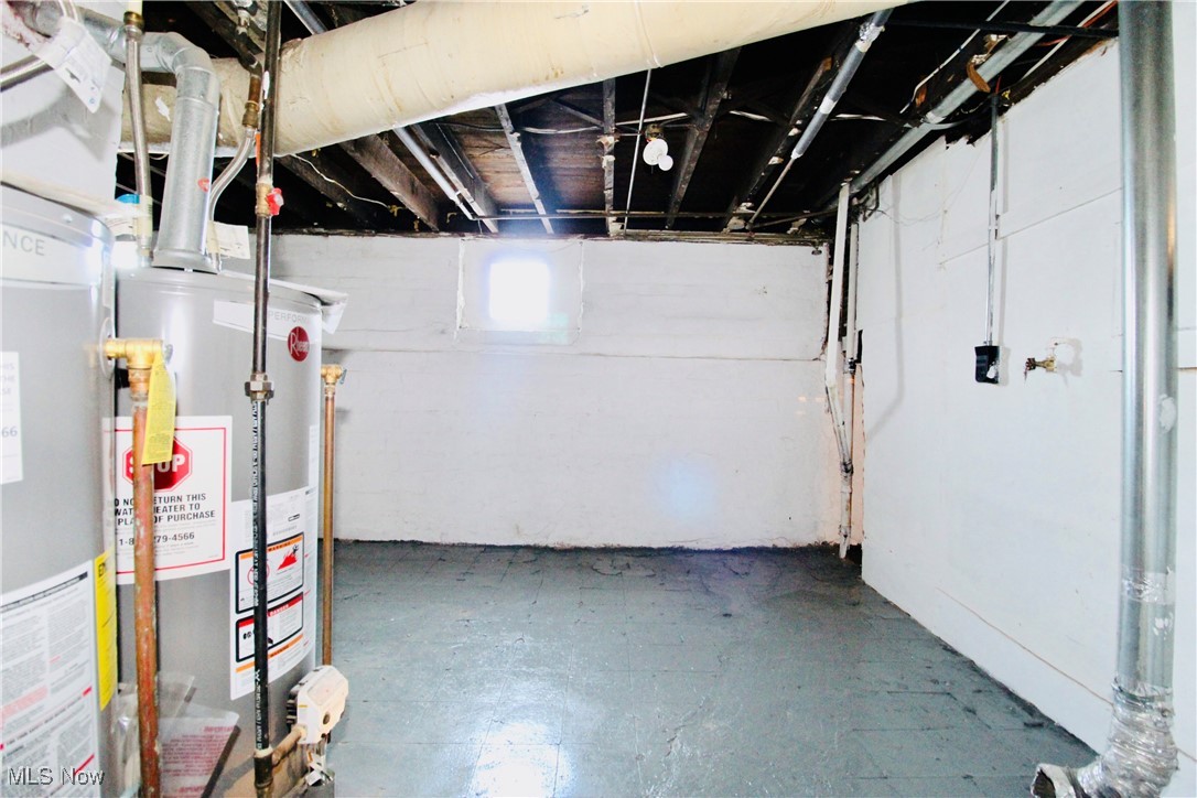 12406 Kinsman Road Cleveland, OH 44120 - Photo 16 of 29 Below grade area with water heater