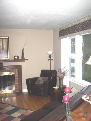 4017 Pinecrest Road Rockford, IL 61107 - Photo 3 of 4 a living room with furniture and wooden floor
