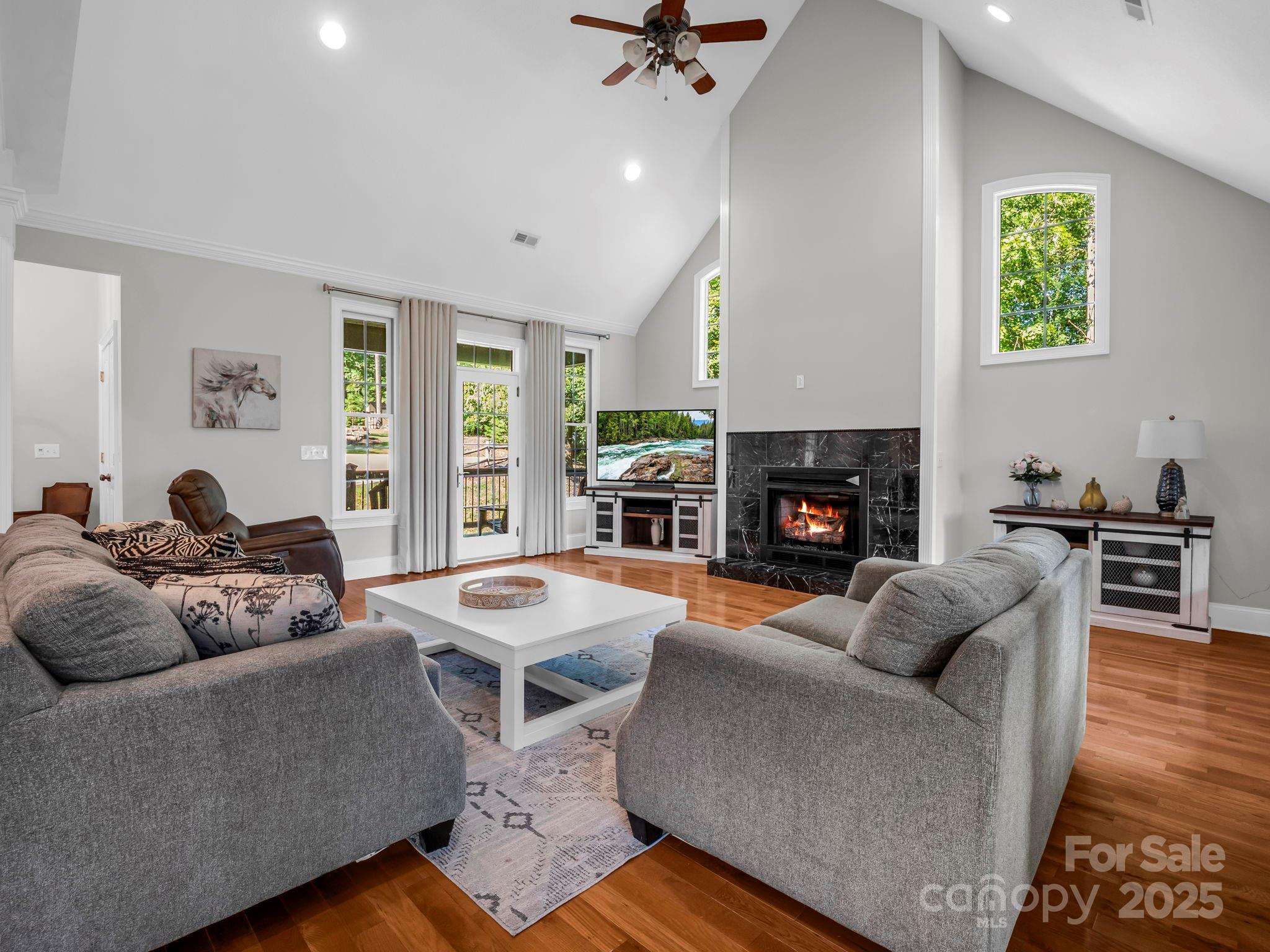 34 West Rambling Creek Tryon, NC 28782 - Photo 11 of 48 a living room with furniture and a fireplace