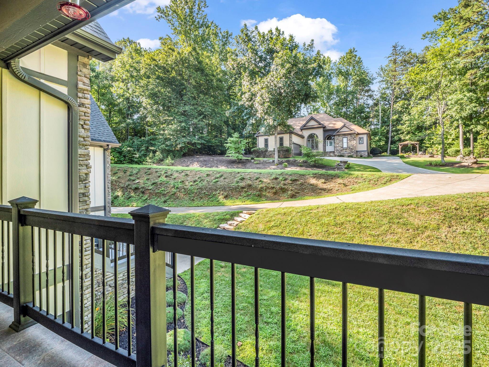 34 West Rambling Creek Tryon, NC 28782 - Photo 13 of 48 a view of a balcony with trees