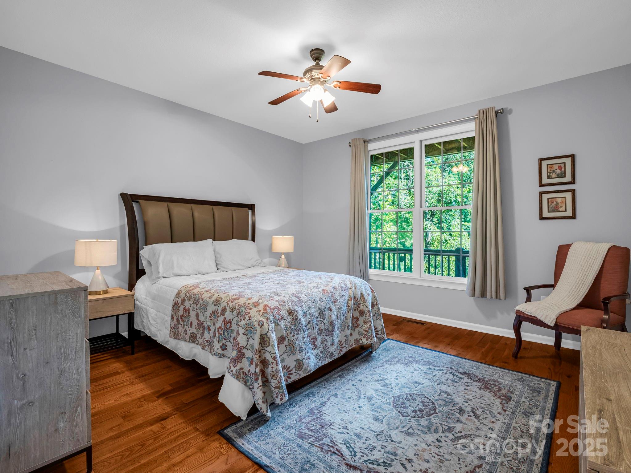 34 West Rambling Creek Tryon, NC 28782 - Photo 26 of 48 a bed room with a bed and a chair