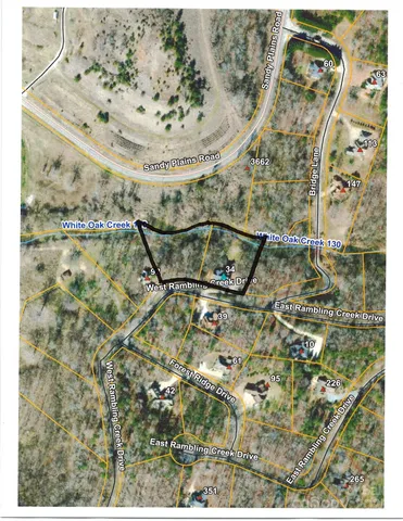 a picture of a bathroom with a shower